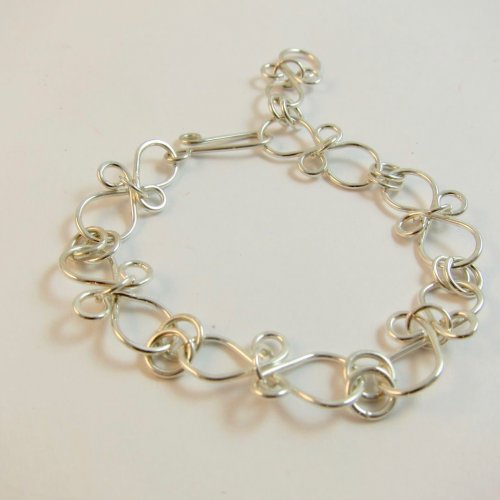 Karen Meador, Ph.D.'s Infinity Link Bracelet - , Contemporary Wire Jewelry, Findings, Clasps, Components, Loops, Wire Loop, Wrapped Wire Loop, Connect the clasp to an end link